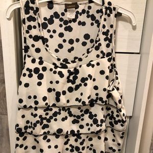 Sleeveless Polka dot blouse.